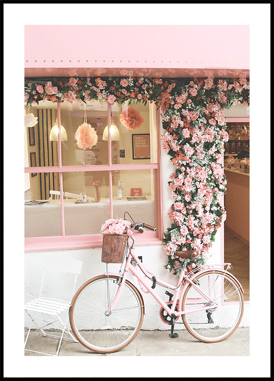 Un vélo rose en fleur Poster