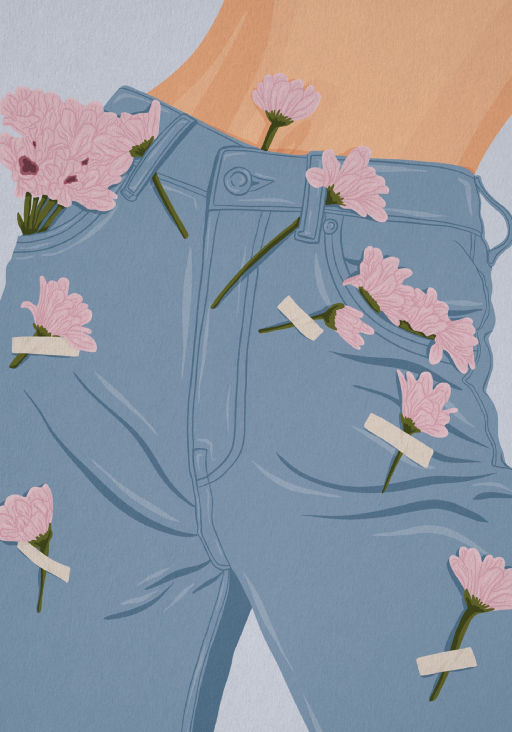 Fleurs roses sur un jean