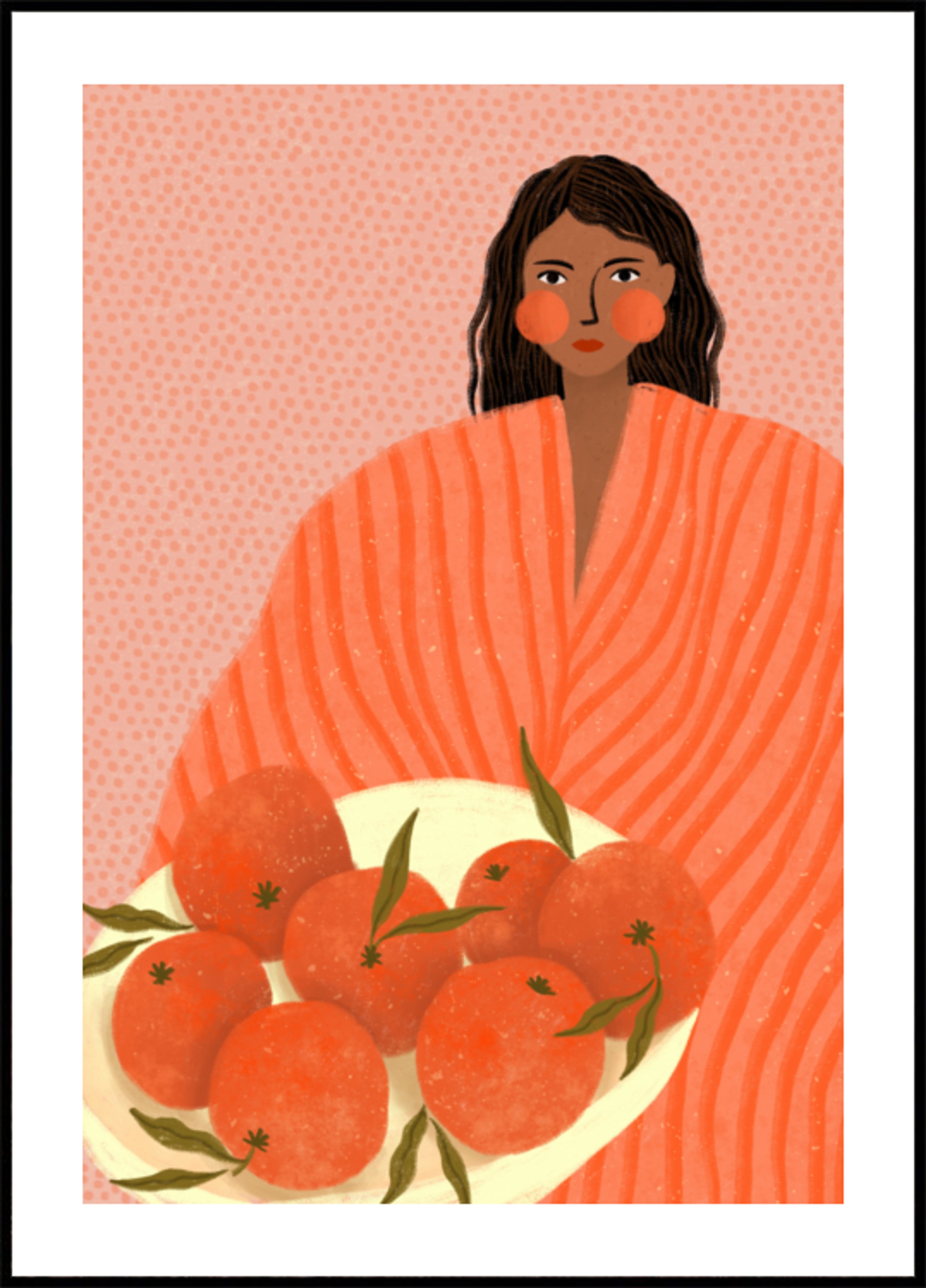 Femme tenant des oranges