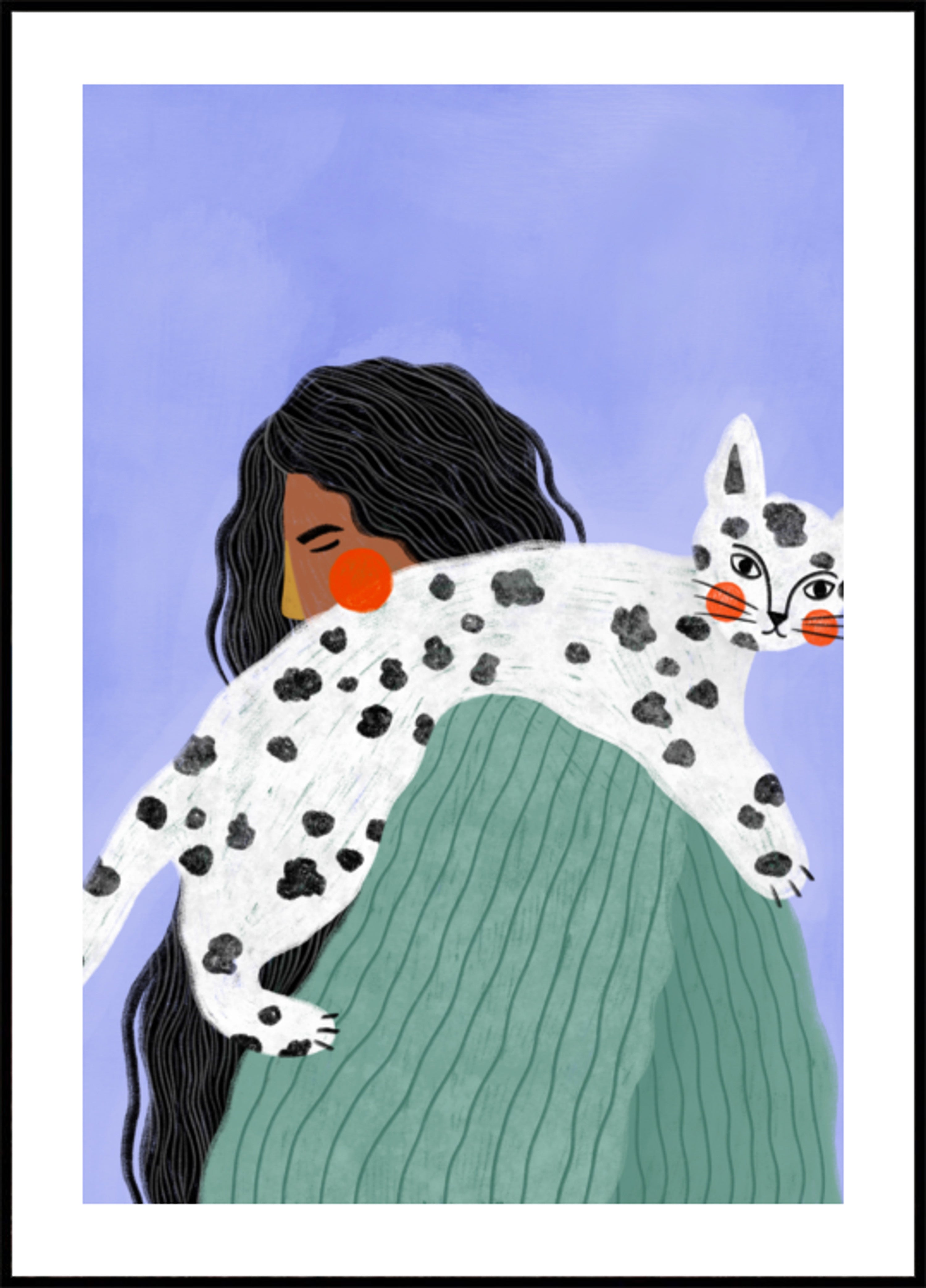 Femme et chat tacheté