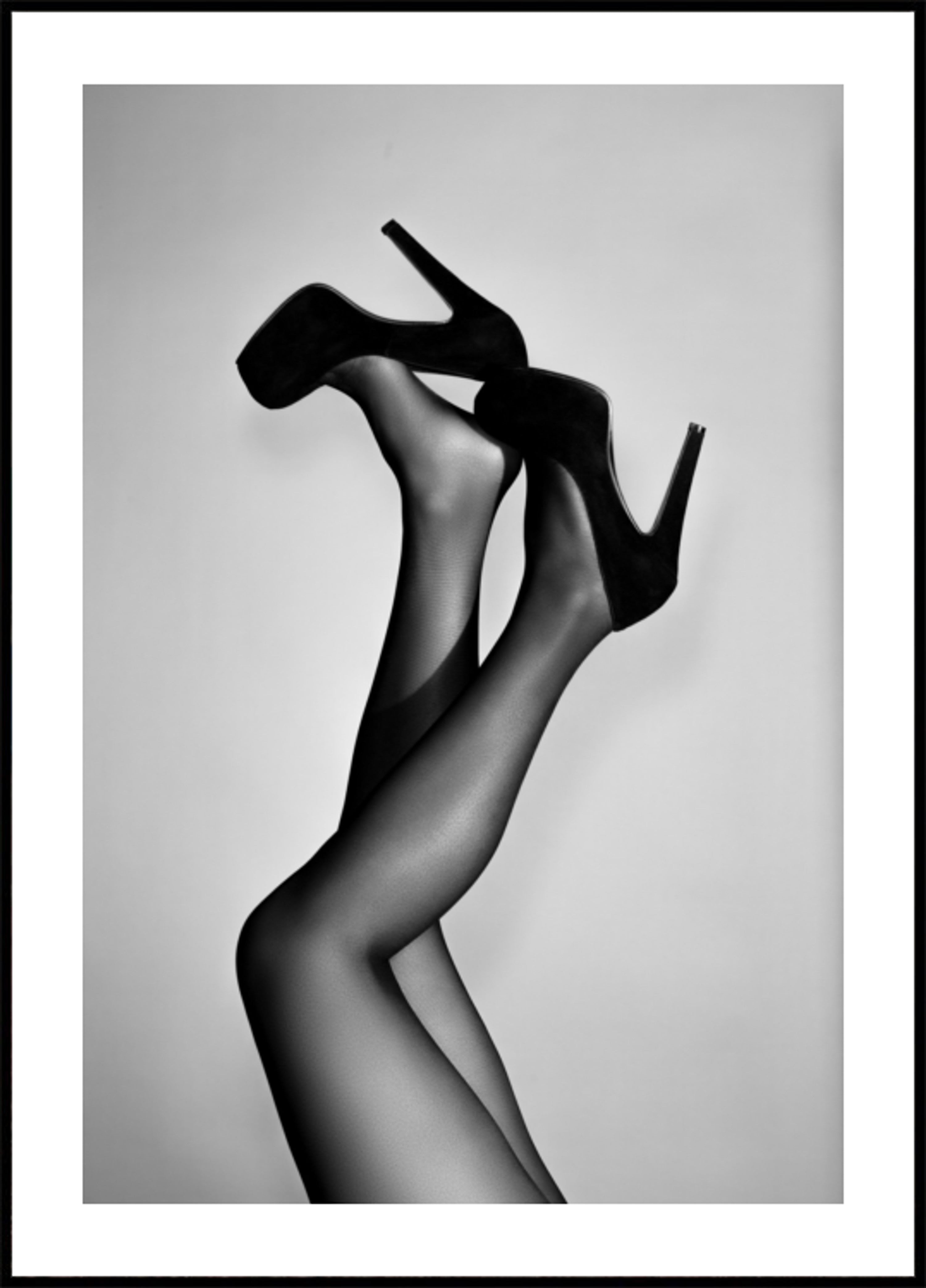 Jambes élégantes à talons hauts